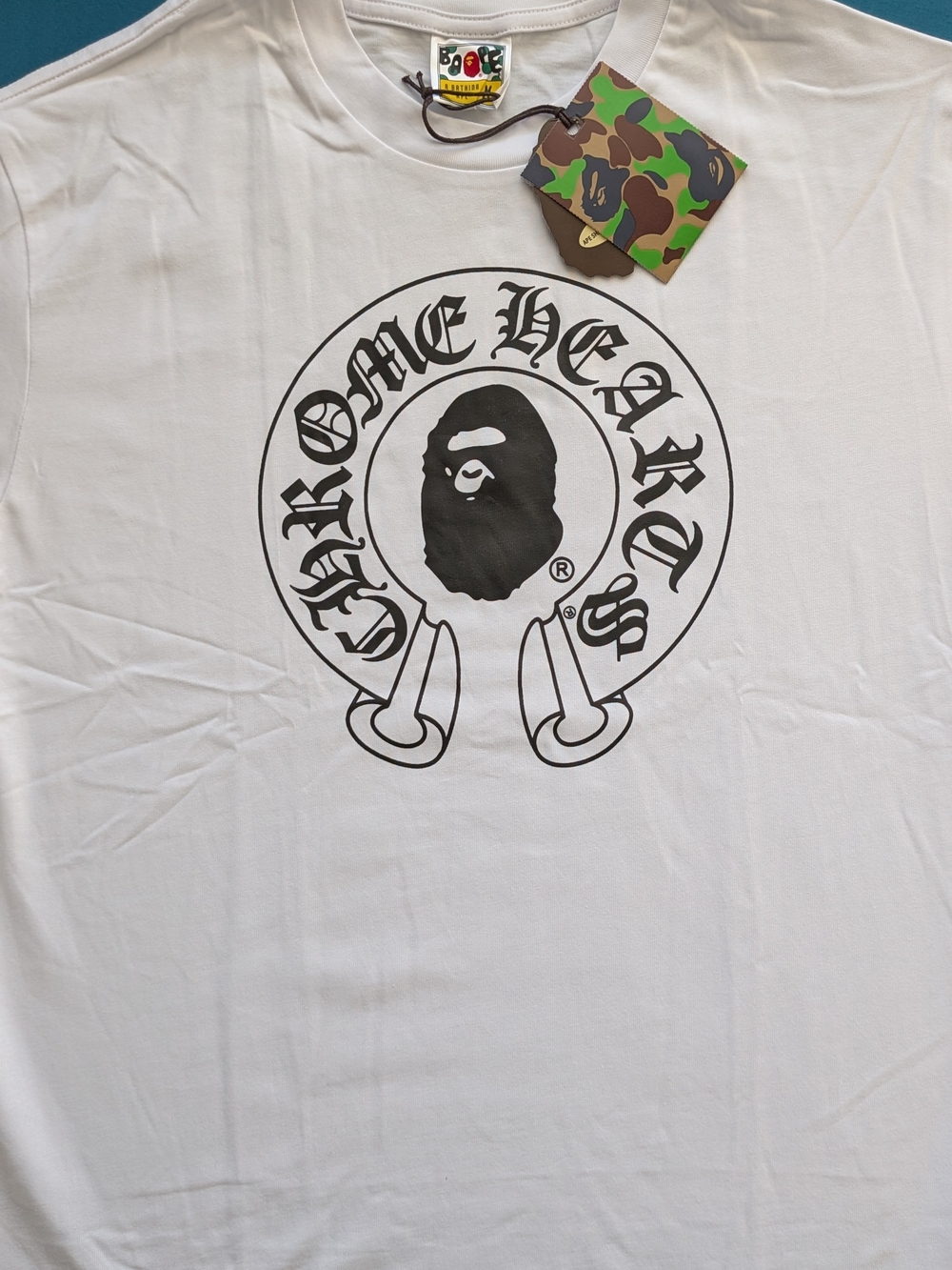 Bape White Short Sleeve Tee with Black Chrome-Style Logo